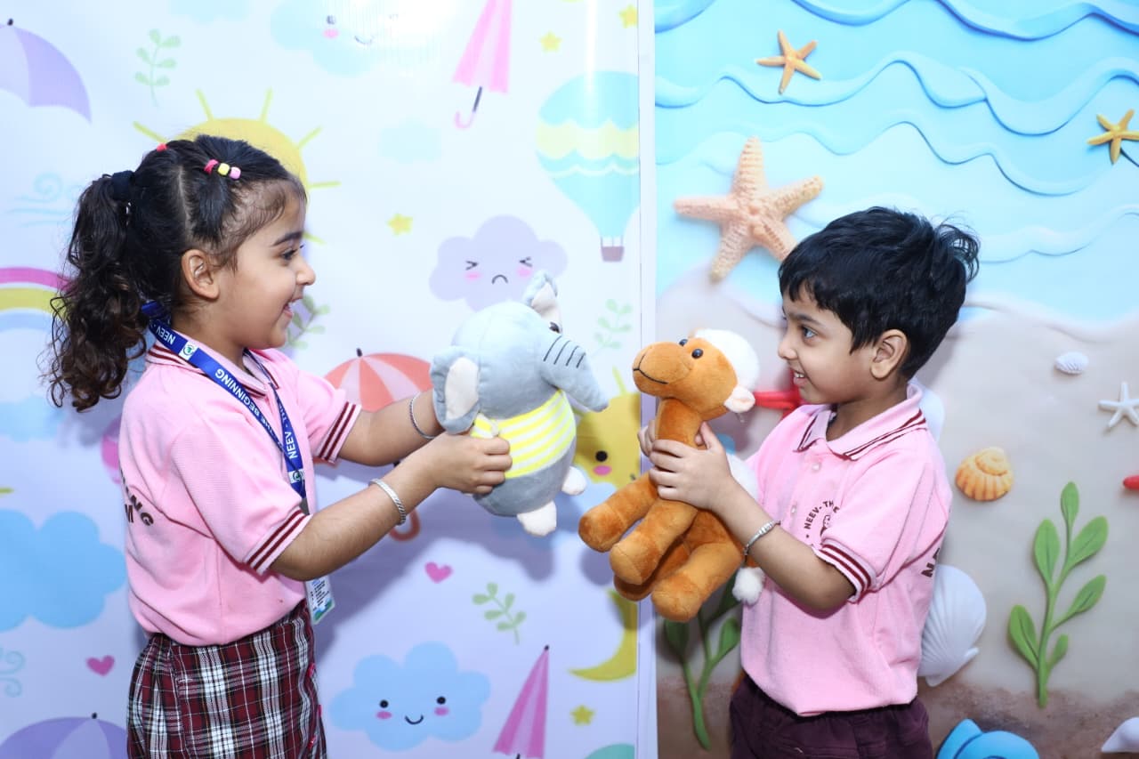 Children engaged in a classroom activity at Neev